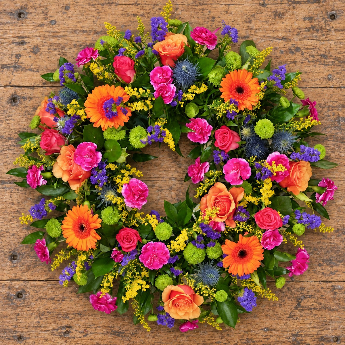 Bright Wreath — overhead workbench view