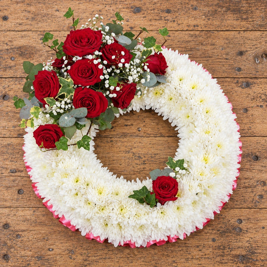 Traditional Massed Wreath — overhead workbench view