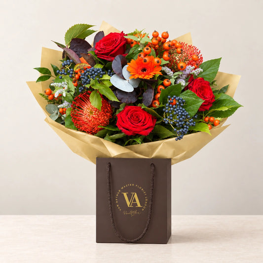Autumn Burst — bouquet in branded Van Arthur bag