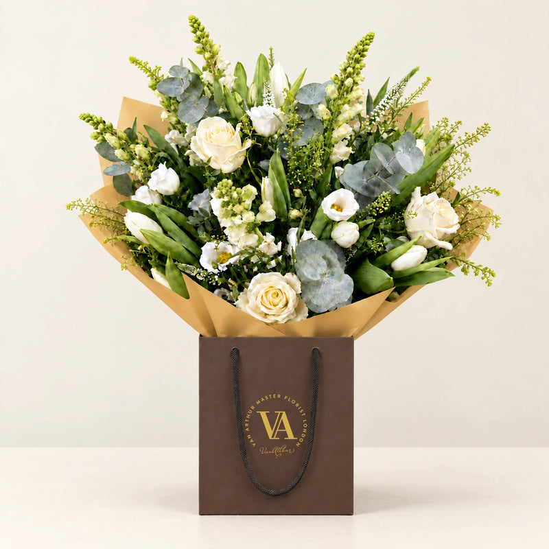 Classic Virginia by Van Arthur Master Florist — the bouquet in signature packaging against a quiet backdrop.