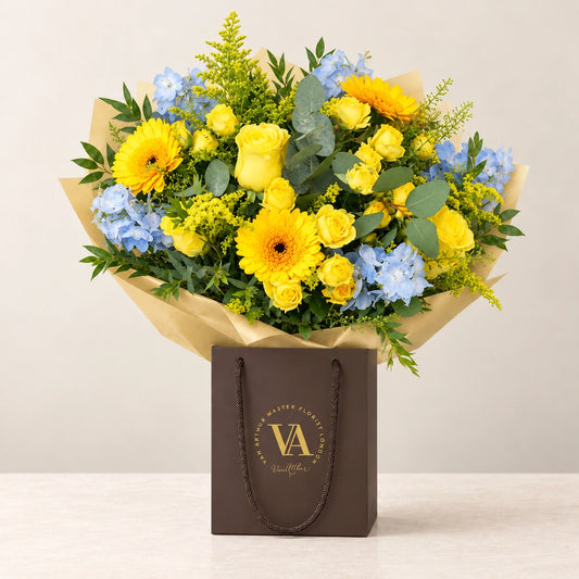 Penelope — bouquet in branded Van Arthur bag