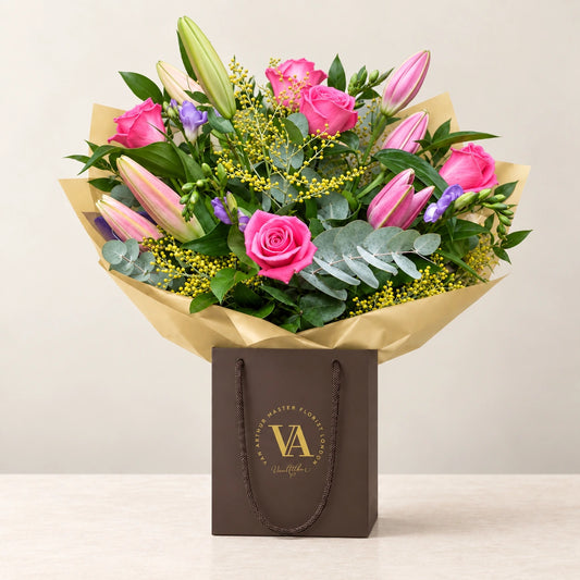 Rose, Lily and Freesia Bouquet — bouquet in branded Van Arthur bag